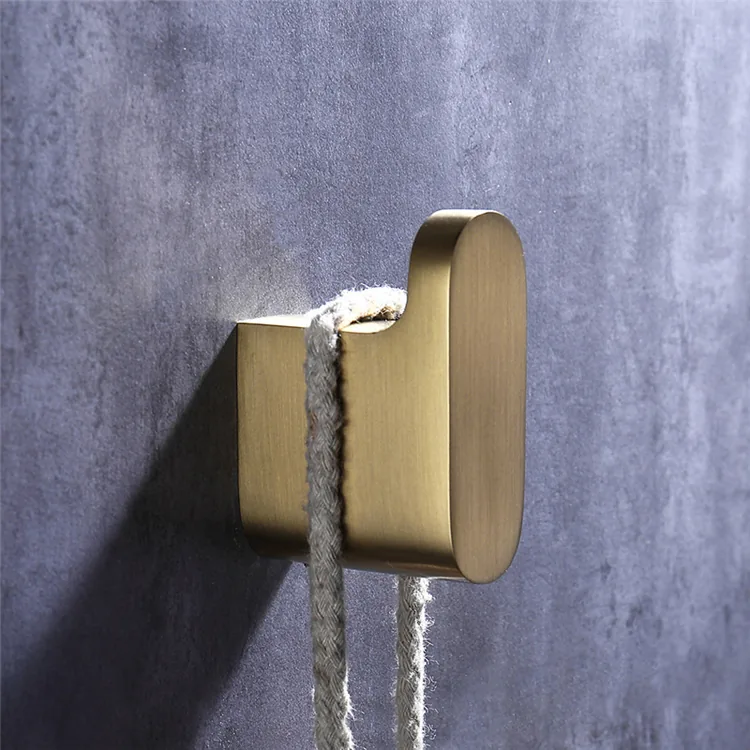 Detail of metal bathroom accessory finish and mounting